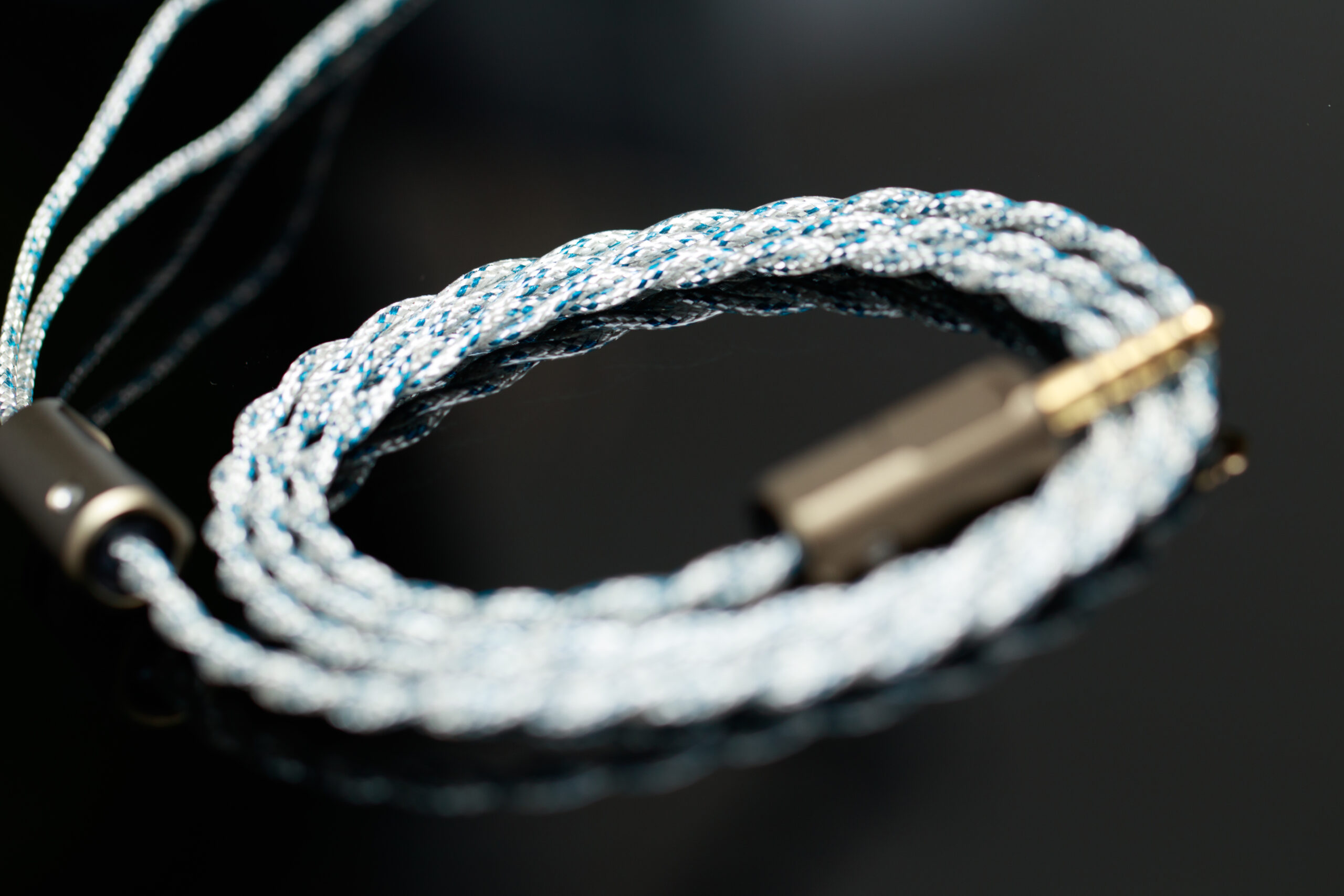 Absolute Zero S looped IEM upgrade cable on black background